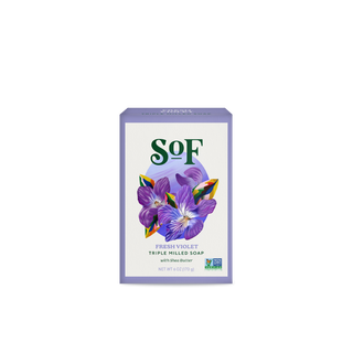 A rectangular box of Fresh Violet Moisturizing Bar Soap with shea butter, featuring purple violets on the front, a Non-GMO Project Verified label, and a paraben free formula for gentle cleansing.