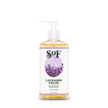 A clear plastic pump bottle of Lavender Fields Nourishing Hand Wash with sea algae, featuring a paraben-free label decorated with purple lavender flowers on a soft purple background; contains yellow liquid.