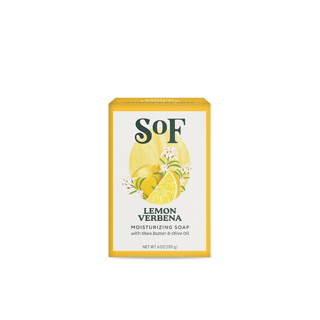 A yellow and white box of Lemon Verbena Moisturizing Bar Soap, a triple-milled soap with organic shea butter and olive oil, shows lemon and white flower illustrations; net weight 6 oz (170 g).