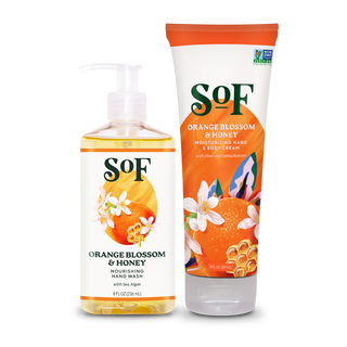 Two SoF products: Orange Blossom & Honey Liquid Hand Wash (8 fl oz pump) and Hand & Body Cream, both with orange and white flower designs.